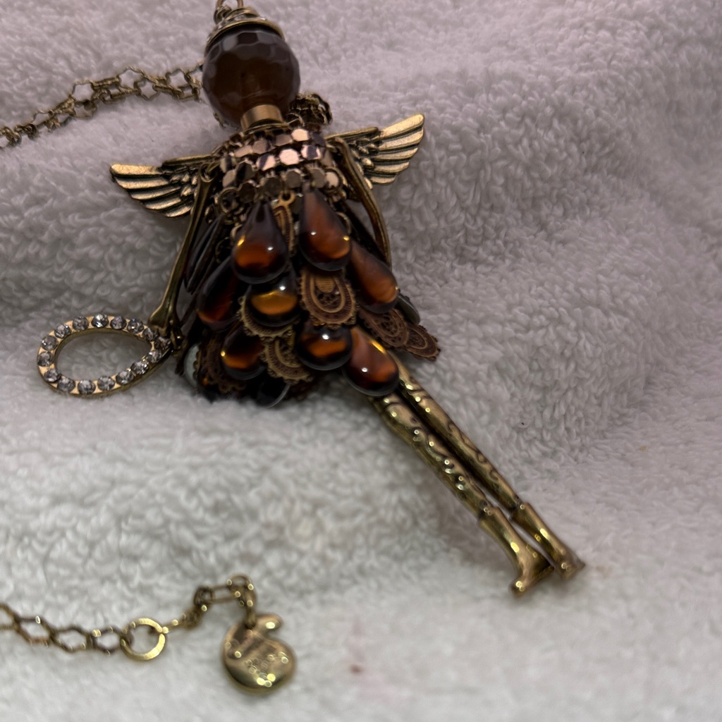 Elegant J.K. Bronze Toned Angel Pendant Necklace. 18” Adjustable Chain.